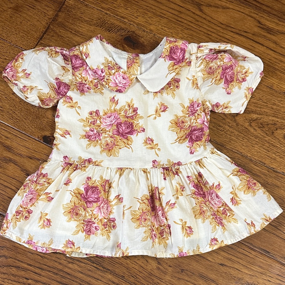Floral Blouse with Pink Roses on a cream Background